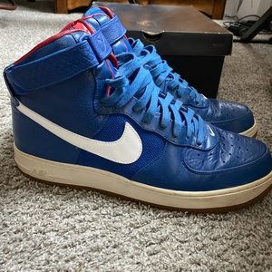 Nike Men's Blue High-Top Sneakers with White Swoosh